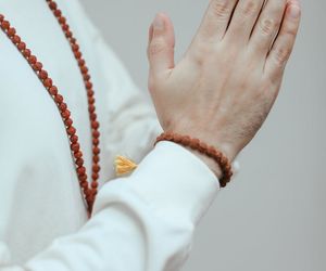 Close up of a person's hands during meditation.